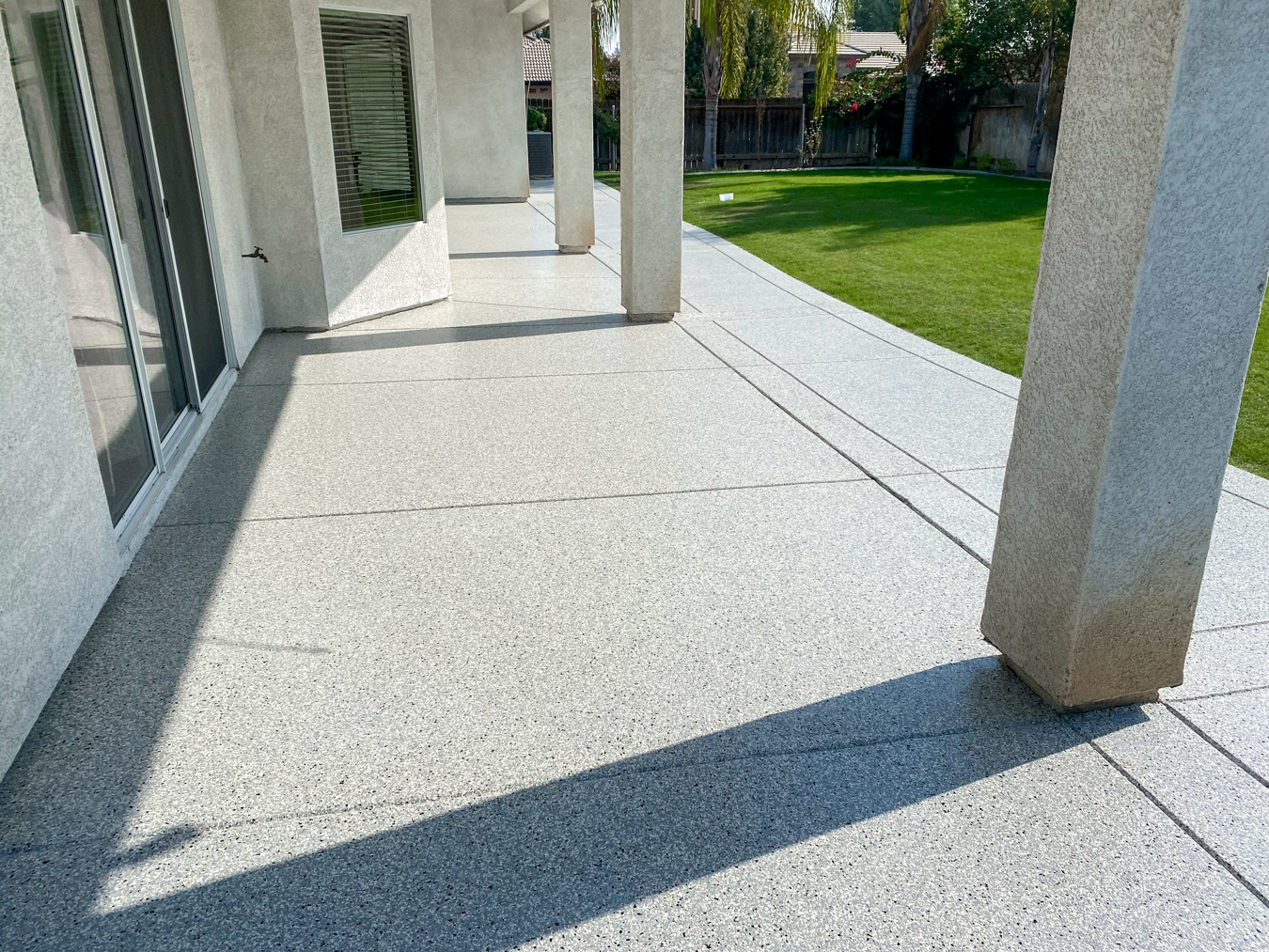 Patio with gray concrete coating