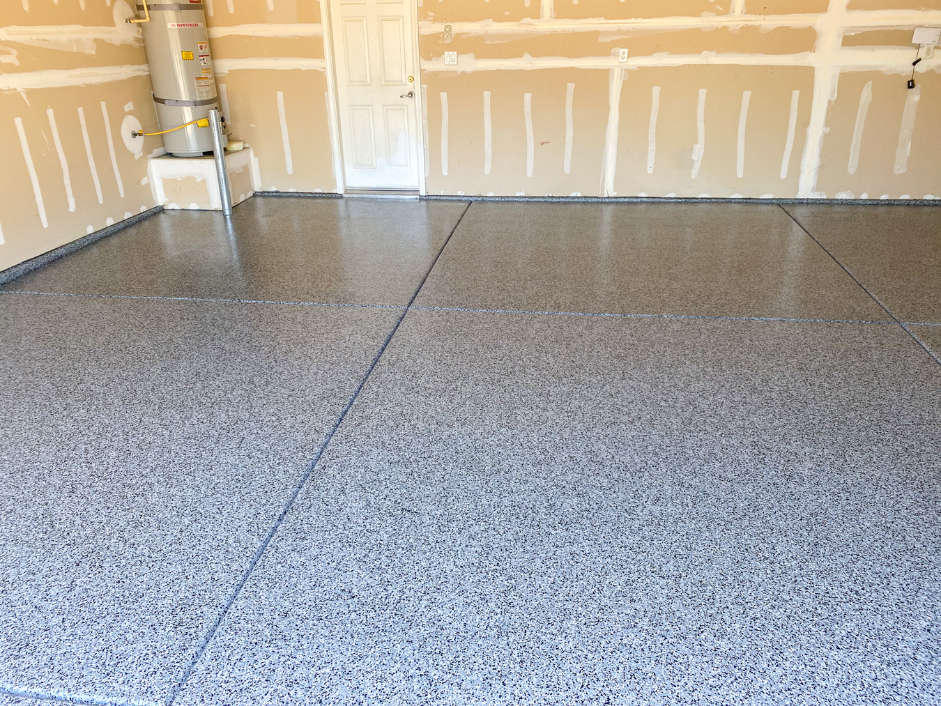Gray Epoxy Concrete Coating on a Garage Floor